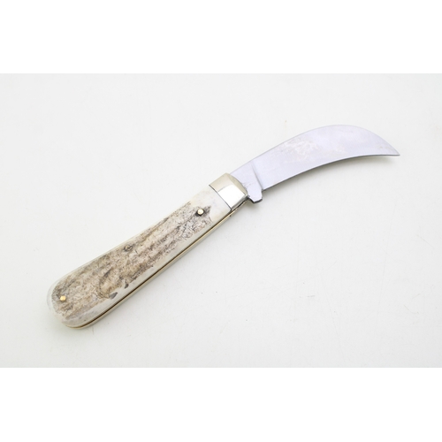 35A - A full pruner pocket knife, by A Wright and Son of Sheffield, with stag handle, blade 7.5cm long.