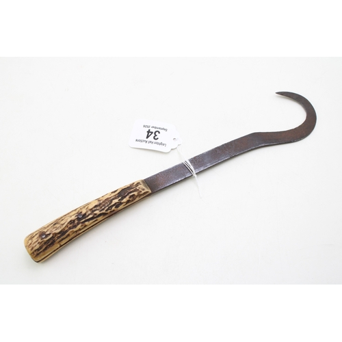 34 - A scarce Sheffield made pruning hook / raspberry cane cutter with stag antler handle, with indistinc... 