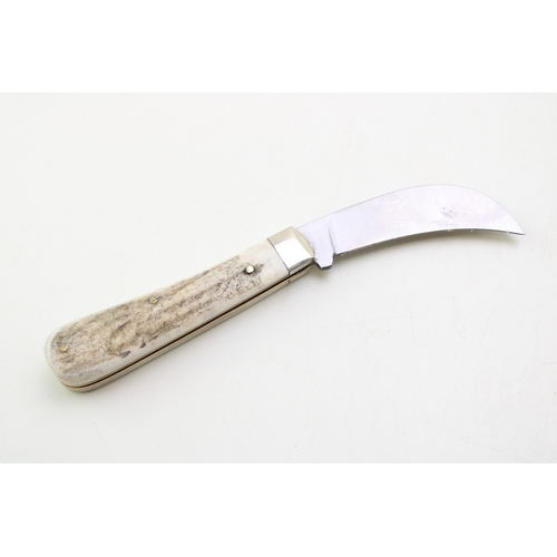 35A - A full pruner pocket knife, by A Wright and Son of Sheffield, with stag handle, blade 7.5cm long.