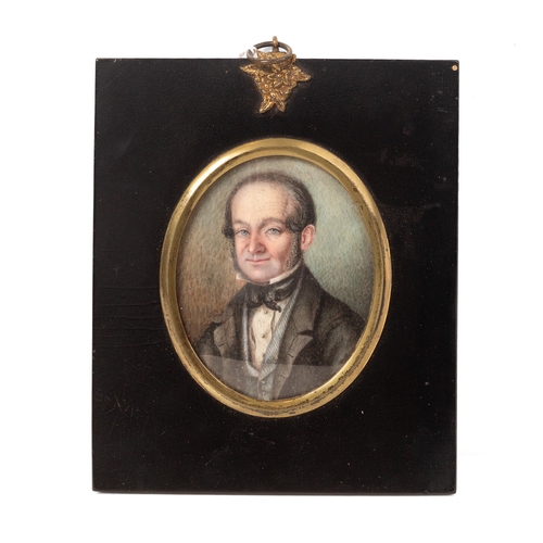 10 - A mid-Victorian portrait miniature of a gentleman, of oval form, delicately painted on ivory, appare... 