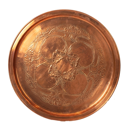4 - A Keswick School of Industrial Arts, Arts & Crafts circular copper charger, the central repoussé pan... 