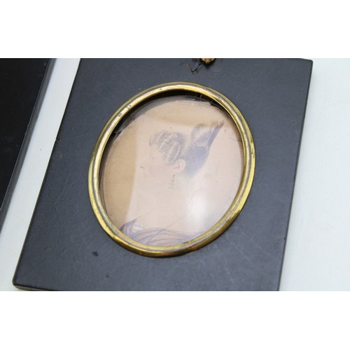 13 - A pair of mid 19th century portrait miniatures on paper of two ladies of fashion, each 8 by 6.5cm, g... 