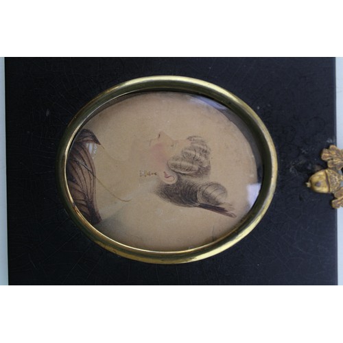 13 - A pair of mid 19th century portrait miniatures on paper of two ladies of fashion, each 8 by 6.5cm, g... 