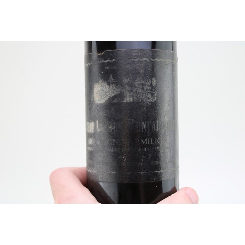 3 - A bottle of 1970 Chateau Latour Montagillon, Montagne Saint Emilio, 75cl Abv 13%.