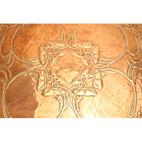 4 - A Keswick School of Industrial Arts, Arts & Crafts circular copper charger, the central repoussé pan... 