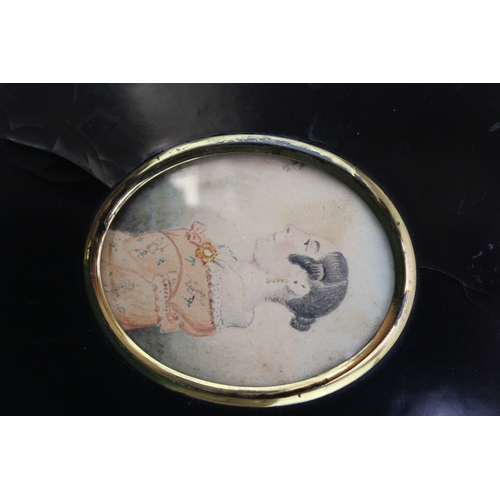 13 - A pair of mid 19th century portrait miniatures on paper of two ladies of fashion, each 8 by 6.5cm, g... 