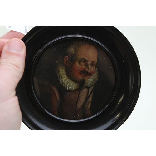14 - A portrait miniature on wood, possibly Dutch, depicting a moustached gentleman in a ruff collar agai... 