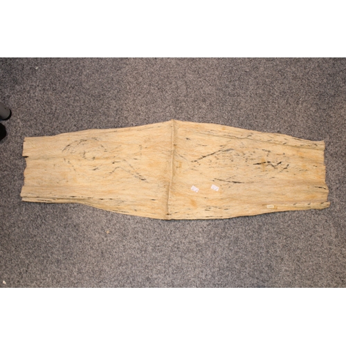 23 - An original Australian Aboriginal painting on bark cloth of a fish and a snake unsigned measuring 87... 
