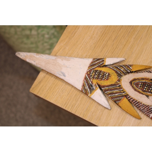28 - An Australian Aboriginal carved wooden spear head painted with natural ochre paint decoration unsign... 