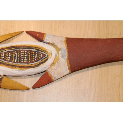 28 - An Australian Aboriginal carved wooden spear head painted with natural ochre paint decoration unsign... 