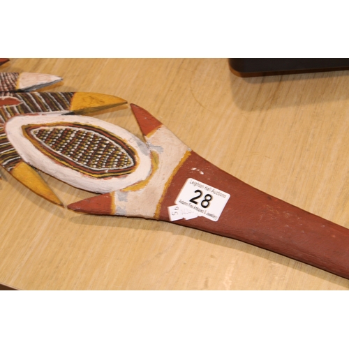 28 - An Australian Aboriginal carved wooden spear head painted with natural ochre paint decoration unsign... 
