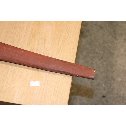 28 - An Australian Aboriginal carved wooden spear head painted with natural ochre paint decoration unsign... 