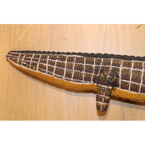29 - Australian Aboriginal wood sculpture of a crocodile painted in natural ochre paint decoration 50 cm ... 