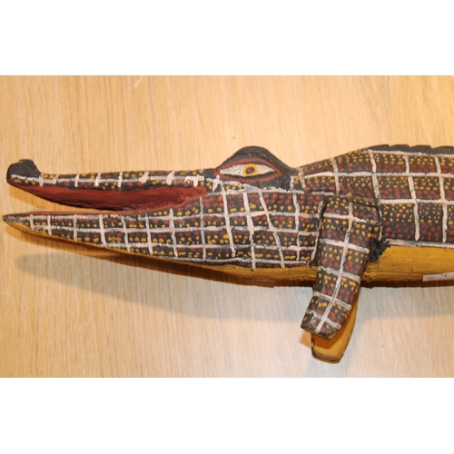 29 - Australian Aboriginal wood sculpture of a crocodile painted in natural ochre paint decoration 50 cm ... 