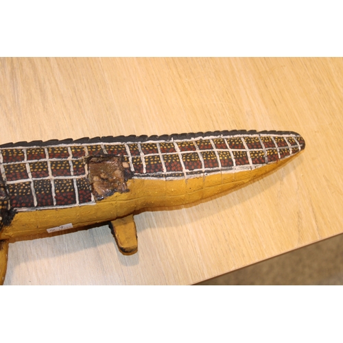 29 - Australian Aboriginal wood sculpture of a crocodile painted in natural ochre paint decoration 50 cm ... 