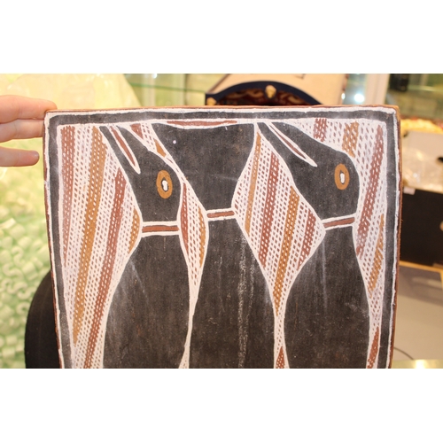 30 - An original Australian Aboriginal Painting using natural ochres of three birds signed on reverse Dji... 