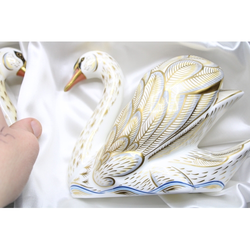 1 - A boxed pair of Royal Crown Derby paperweights, The Royal Swans 
