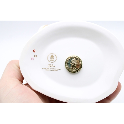 23 - Royal Crown Derby paperweight, Otter, a gold signature edition specially commissioned by The Guild o... 
