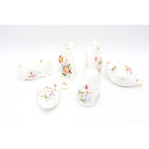34 - Six Royal Crown Derby paperweights decorated in the Posies Pattern, comprising of a Pig, Penguin, Ha... 