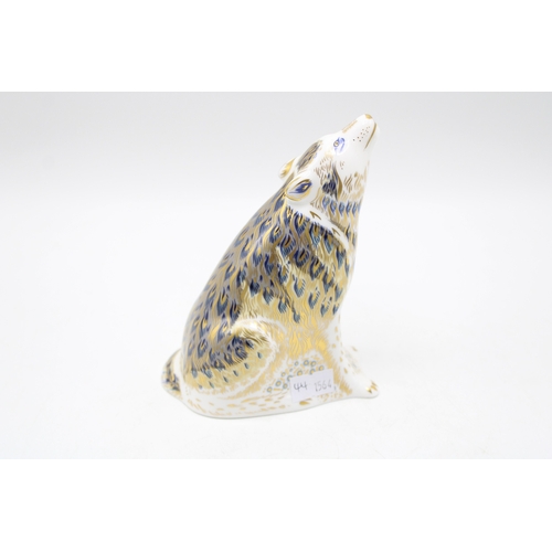 44 - Royal Crown Derby paperweight, Wolf, 13cm high, date code for 2009 (MMIX), gold stopper, red printed... 