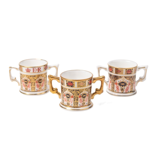 53 - Royal Crown Derby miniature 1128 imari loving cups to include a Diamond Jubilee example, 60 Years An... 