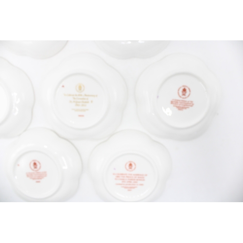 55 - Boxed Royal Crown Derby trays to include a Centenary of World War One five petal example, a Golden W... 