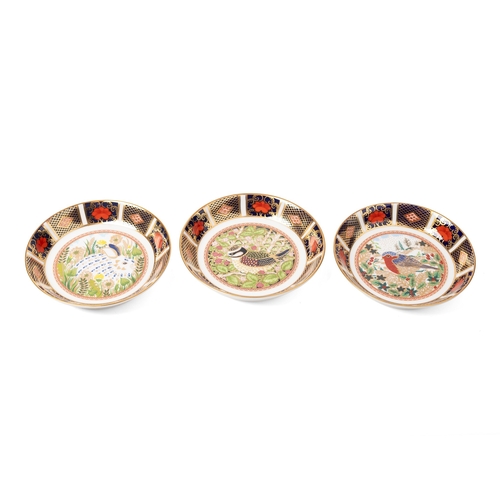58 - Boxed Royal Crown Derby trays to include 1999 Rabbit, 1998 Blue Tit and a Robin (3).