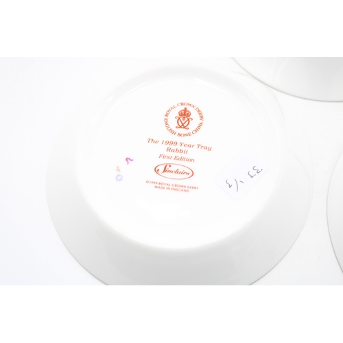 58 - Boxed Royal Crown Derby trays to include 1999 Rabbit, 1998 Blue Tit and a Robin (3).