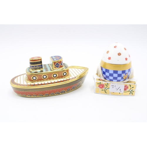 60 - Two boxed Royal Crown Derby paperweights to include Humpty Dumpty and Diamond Jubilee Tug Boat (cert... 