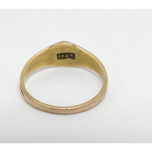 1002 - A child's yellow metal ring