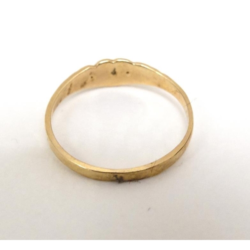 1016 - A child's 10k gold ring set with central diamond