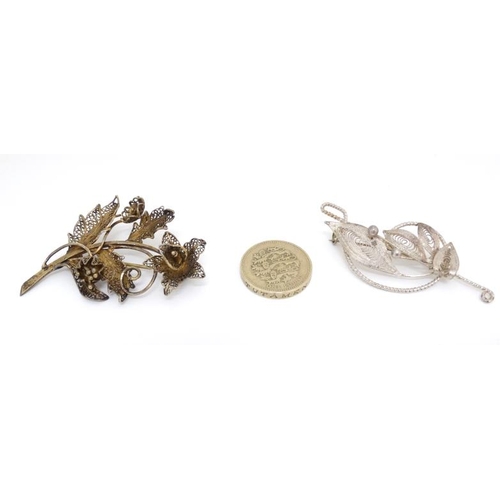 1032 - A .925 silver filigree brooch maker HA together with a Continental white metal gilt filigree brooch ... 