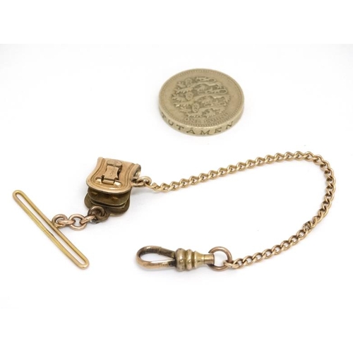 1042 - A gilt metal short watch chain / chatelaine clip marked PAT 6908 JMFCo.