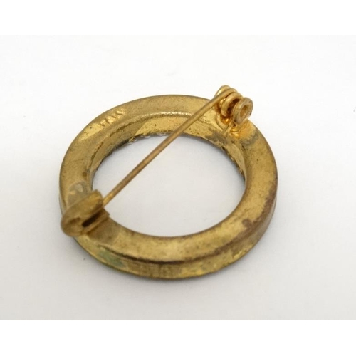 1043 - Micromosaic: A gilt metal brooch of circular form with band of micro mosaic decoration. Marked 'Ital... 