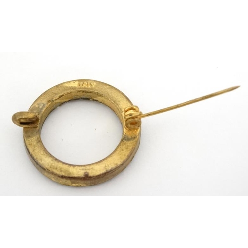 1043 - Micromosaic: A gilt metal brooch of circular form with band of micro mosaic decoration. Marked 'Ital... 