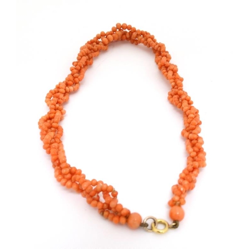 1044 - A vintage necklace of graduated coral beads. Approx 18'' long