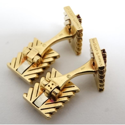 1054 - Van Cleef & Arpels : A pair of 18ct gold cufflinks with chevron design set with rows of rubies. Numb... 