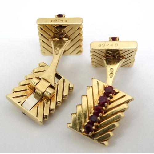 1054 - Van Cleef & Arpels : A pair of 18ct gold cufflinks with chevron design set with rows of rubies. Numb... 