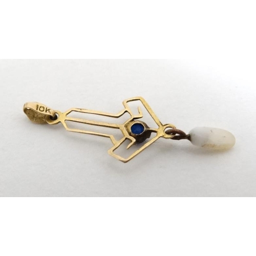 1075 - A 10k gold pedant set with blue stone and white chip drop 1'' long