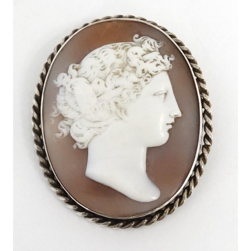 1095 - A classical carved shell cameo in a white metal mount 2'' high