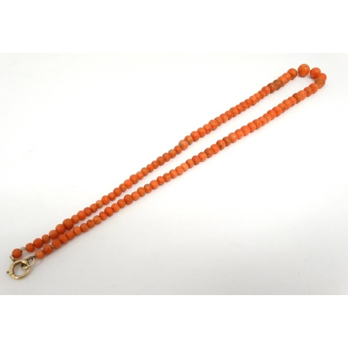 1108 - An early 20thC necklace of graduated coral beads. Approx 18'' long