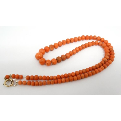 1108 - An early 20thC necklace of graduated coral beads. Approx 18'' long