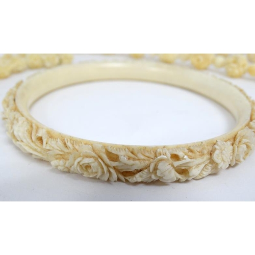 1123 - A 19thC Cantonese carved ivory bangle together with a bead necklace  (2)