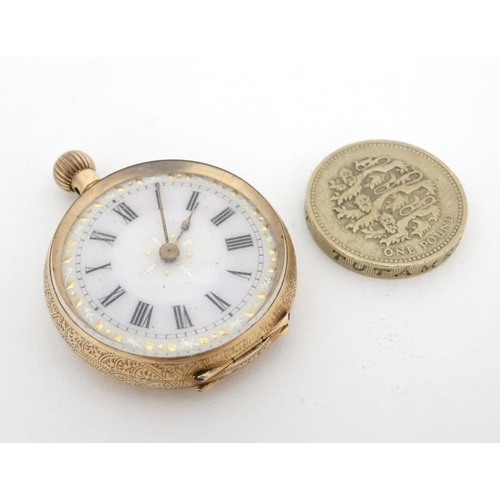 1129 - Gold cased pocketwatch : a 14k? ( mark rubbed) Gold cased ( chased decoration )  Top Wind ladies fob... 