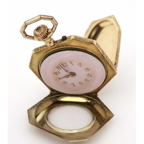 1130 - Enamel and 14 K gold Fob Watch: a French Heptagon top wind fobwatch profusely chased and decorated w... 