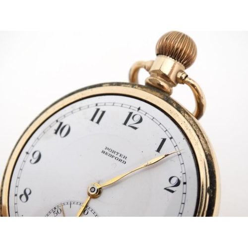 1133 - 'Porter Bedford ' gilt cased pocket watch : an open faced Top wind Pocketwatch having 14 ct front an... 