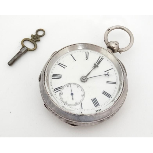 1139 - Chester HM silver Pocket Watch : a Key Wind open faced Pocketwatch, bearing inscription to dust cove... 