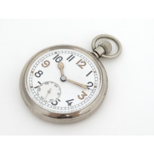 1140 - Military Pocket Watch : a Top Wind nickel cased MOD Crow's Foot marked ' Bravingtons' pocketwatch wi... 