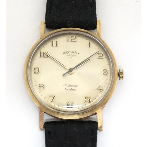 1151 - Wrist Watch : a 9 ct (.375) Gold cased Rotary Gents Wristwatch  with convex champagne coloured dial,... 