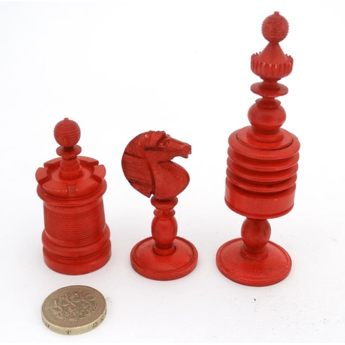 1185 - A carved and red stained bone Barleycorn Captain Cook style chess set in wooden box with mother of p... 